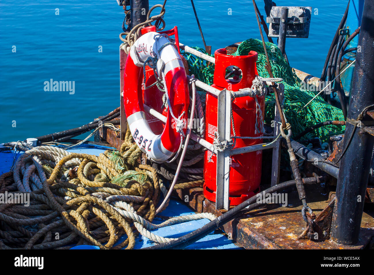 8 August 2019 The clutter stowed on the deck of a working trawler in berthed in Ardglass harbour County Down Northern Ireland Stock Photo