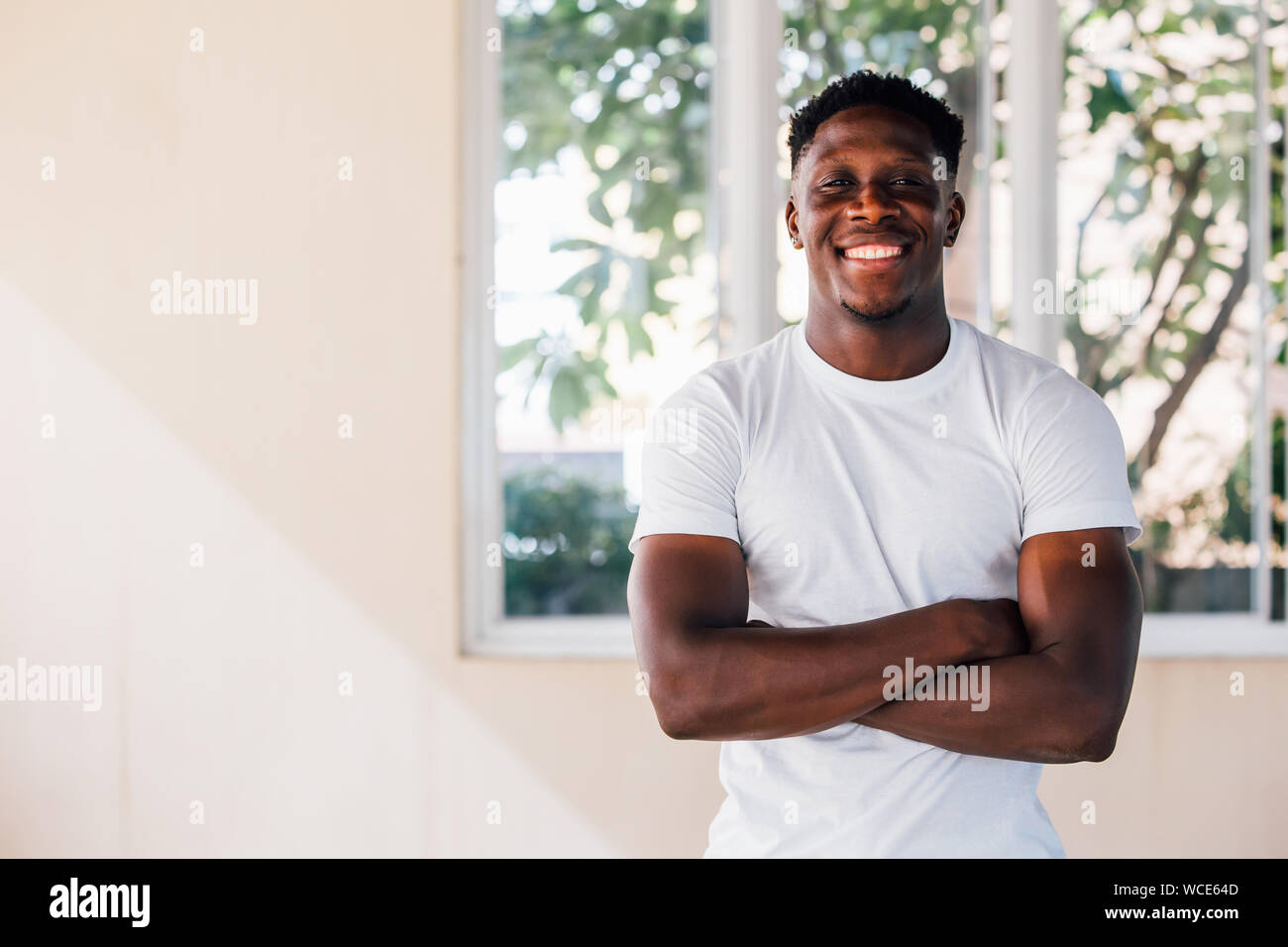 African american male gym trainer hi-res stock photography and images ...