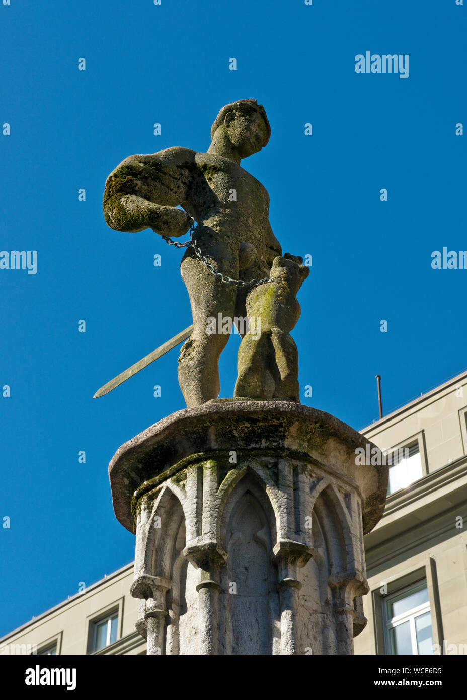 Medieval Bärenplatz statue above fountain on . Old Town, Bern, Switzerland Stock Photo