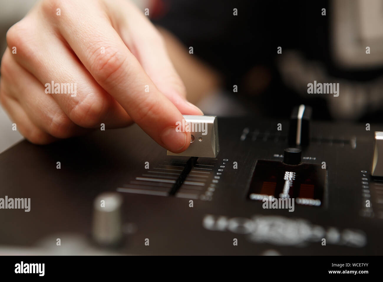 Female hip hop dj plays music in night club.Professional disc jockey