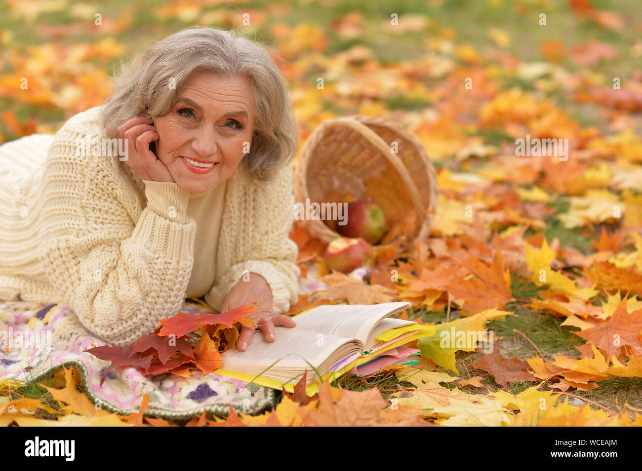 Woman resting at the park hi-res stock photography and images - Alamy
