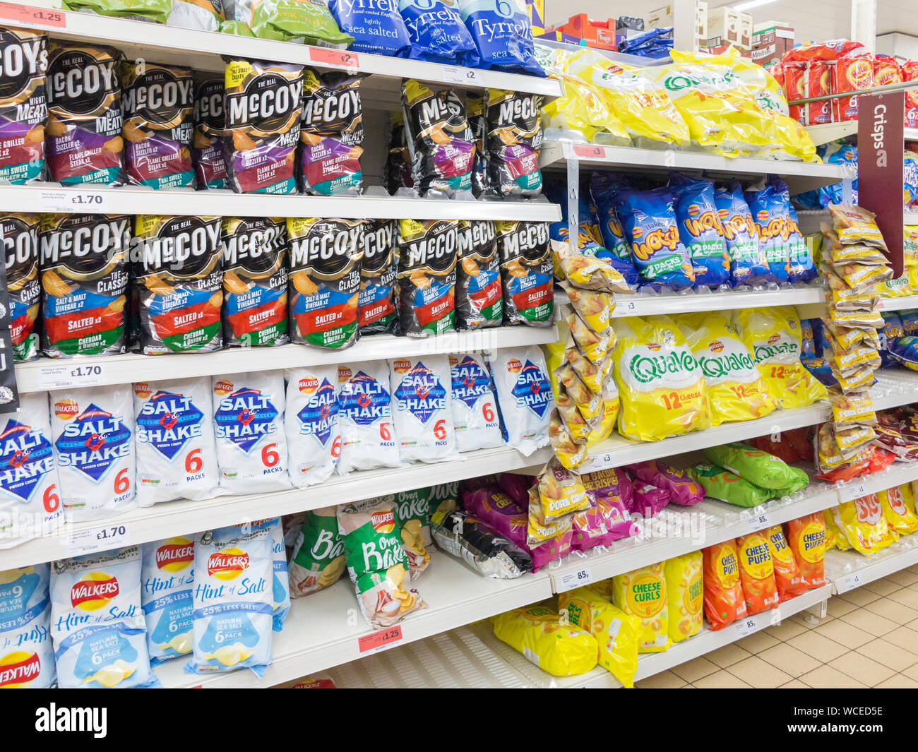 Crisps for sale on a Sainsbury supermarket shelf, UK Stock Photo