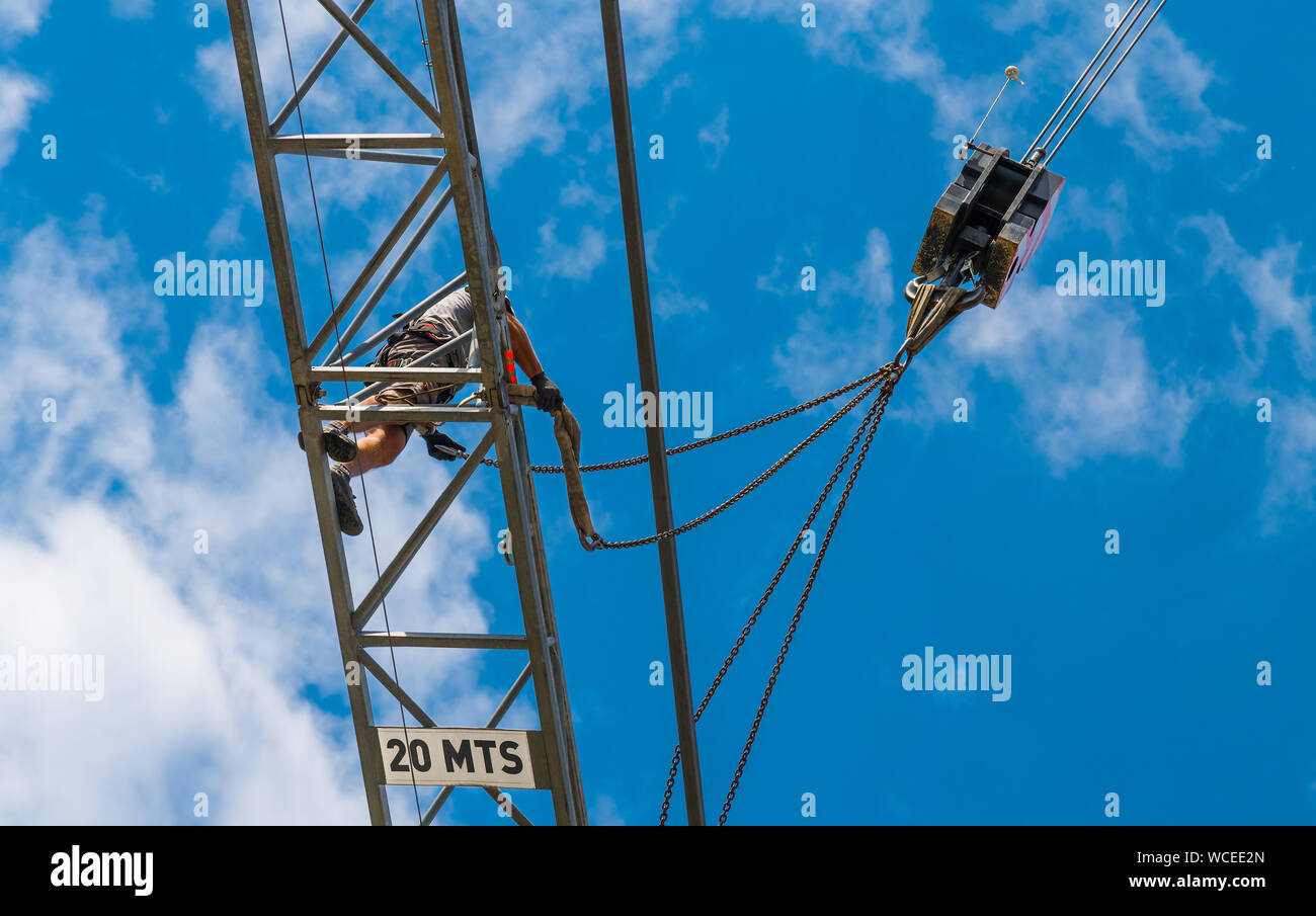 Tower crane installation. Hoist device detail. Work at heights. Working