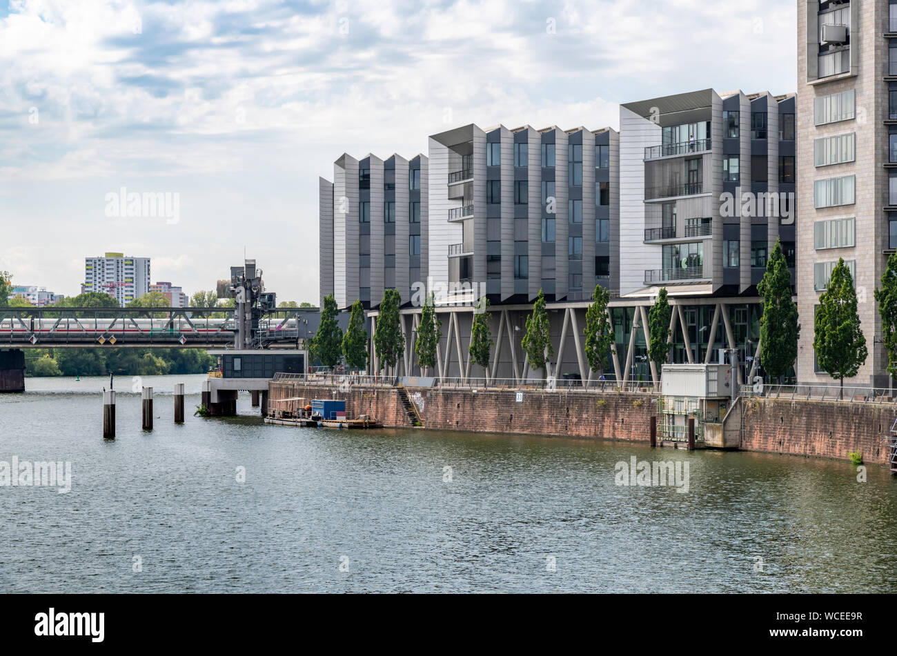 The Westhafen district of Frankfurt. In this area are the harbour and marina, Westhafen Tower is the tallest building also known as das Gerippte. Stock Photo