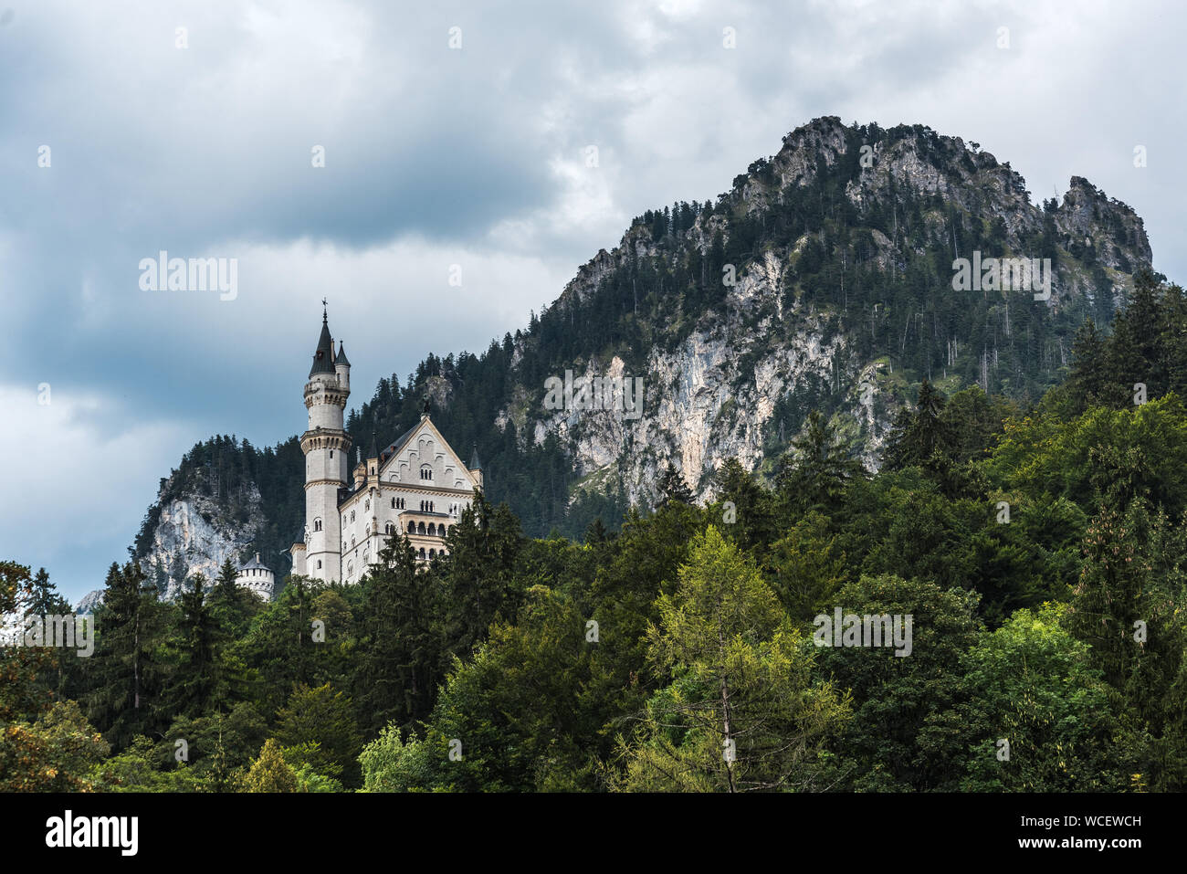 Horizontal shot. view from the village of Hohenschwangau on the Neuschwanstein castle - famous Europe, and German Landmark in style of Romanesque Revi Stock Photo