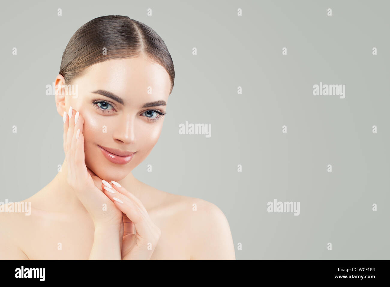 Unclear Kin On Face Cheerful young woman with clear skin. Skincare and facial treatment ...