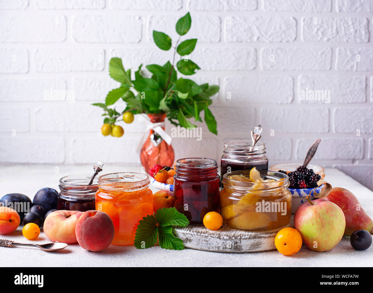 Assortment of different jams in gars Stock Photo - Alamy