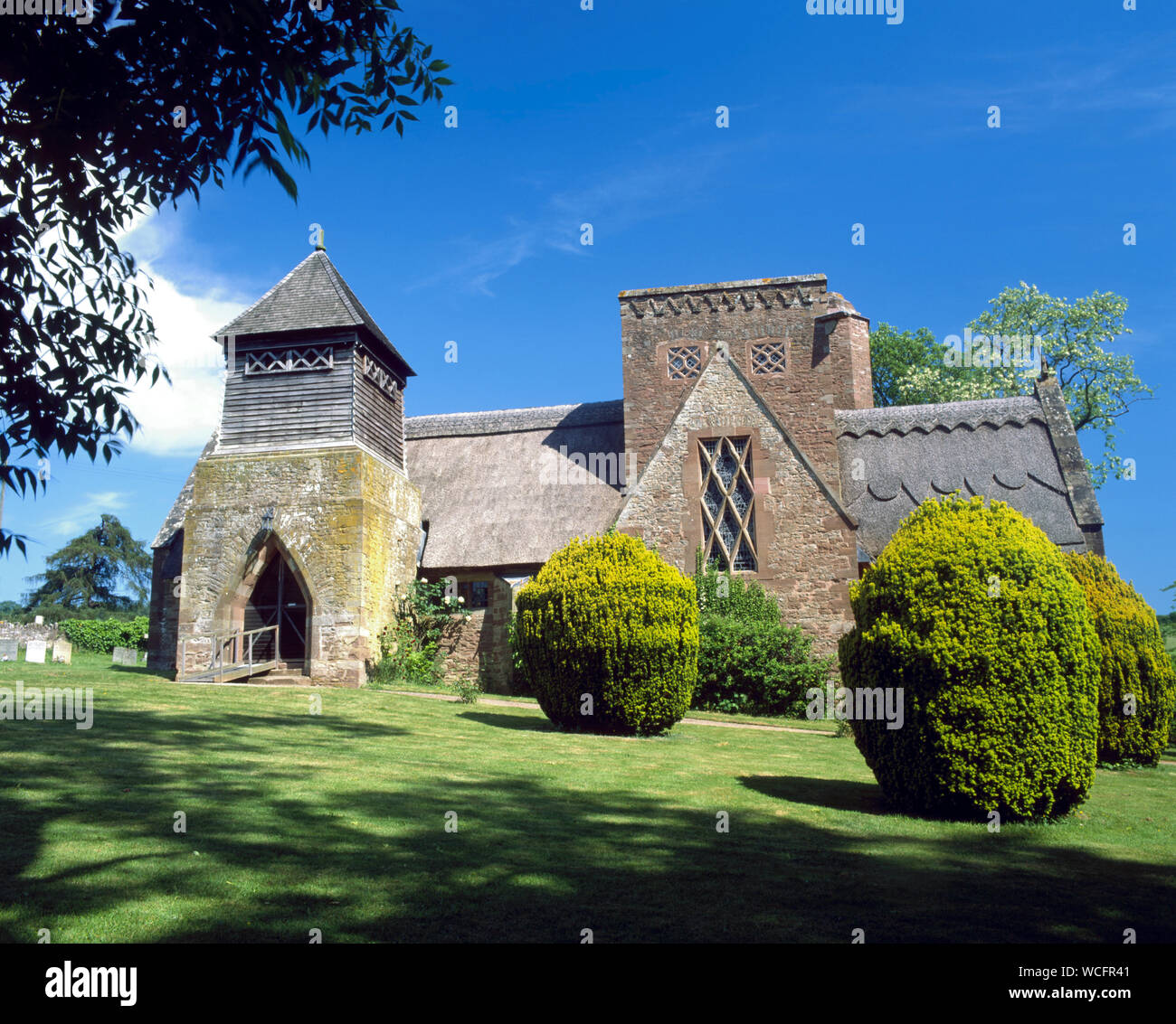 Thatched All Saints Church, Brockhampton, Herefordshire. Designed by William Lethaby in the Arts and Craft style1902. Stock Photo