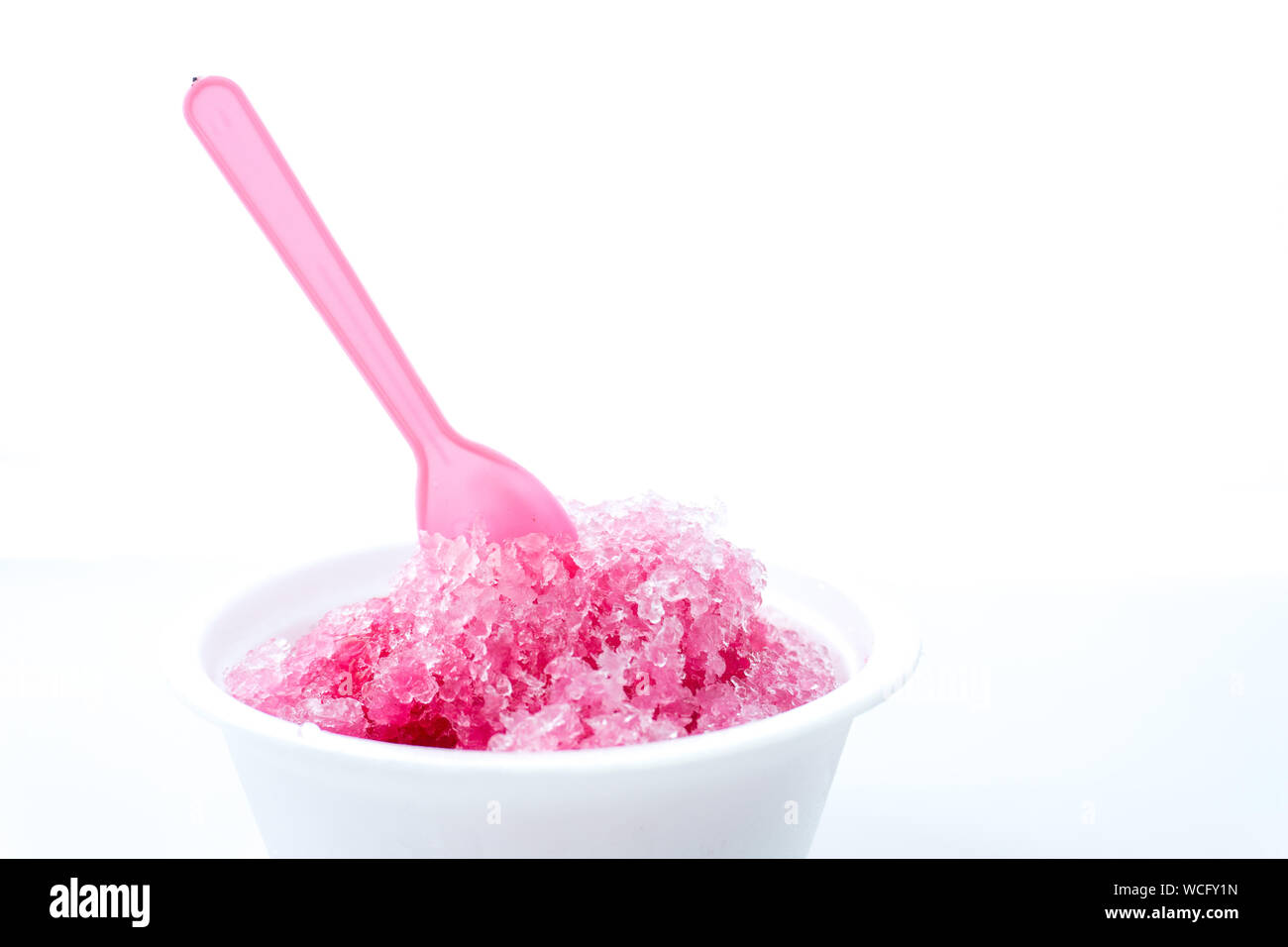 Close-up Of Flavored Ice Against White Background Stock Photo