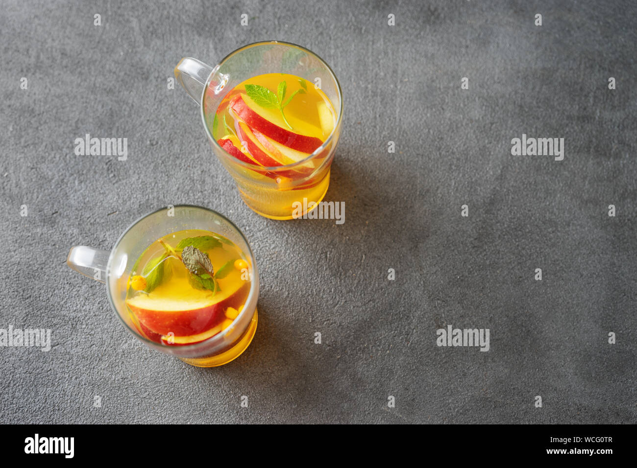 Top view of apple tea into two glass cups Stock Photo