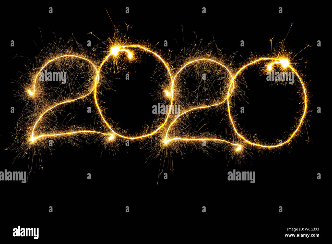 New Year 2020 arranged from sparking digits over black background Stock Photo