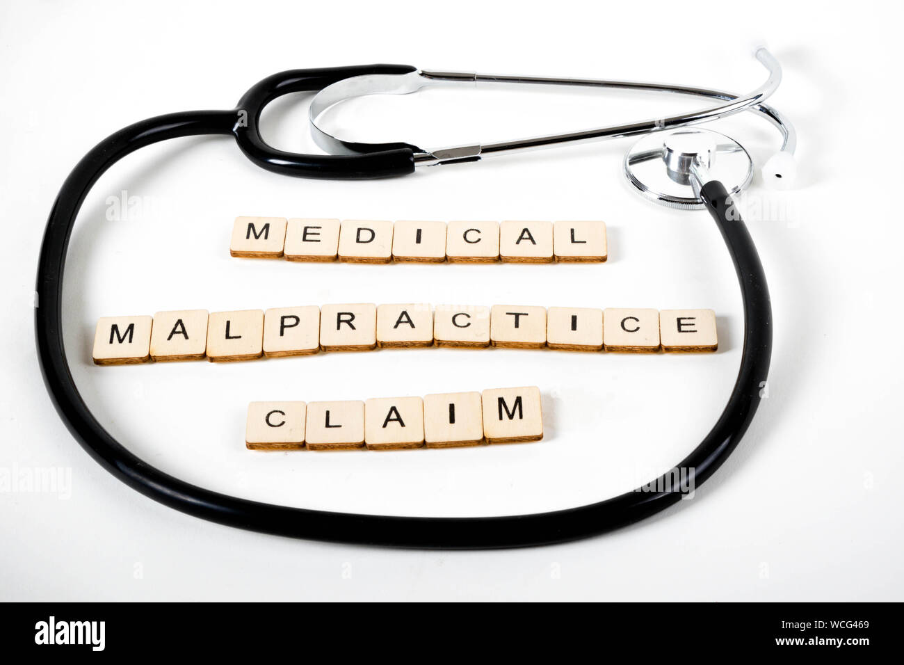 Medical or Healthcare concept with a stehoscope and the message Medical Malpractice Claim Stock Photo