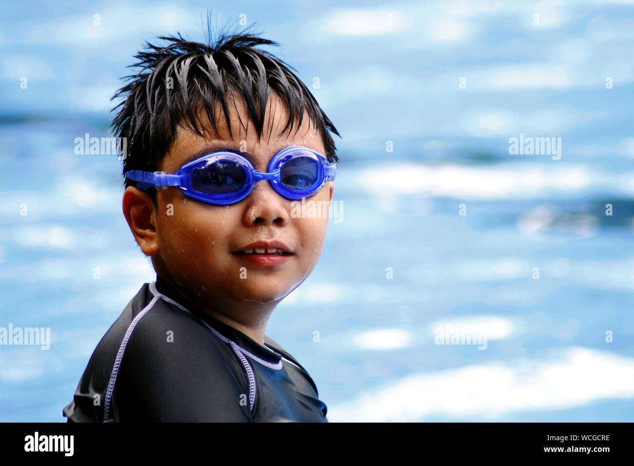 Boy swimming in swimming pool hires stock photography and images Alamy