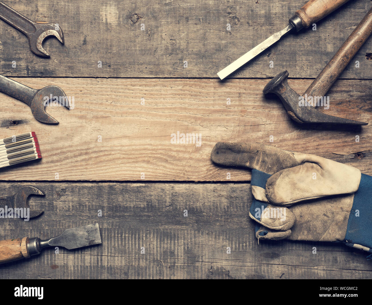 Old used tools on a workbench with space for text Stock Photo