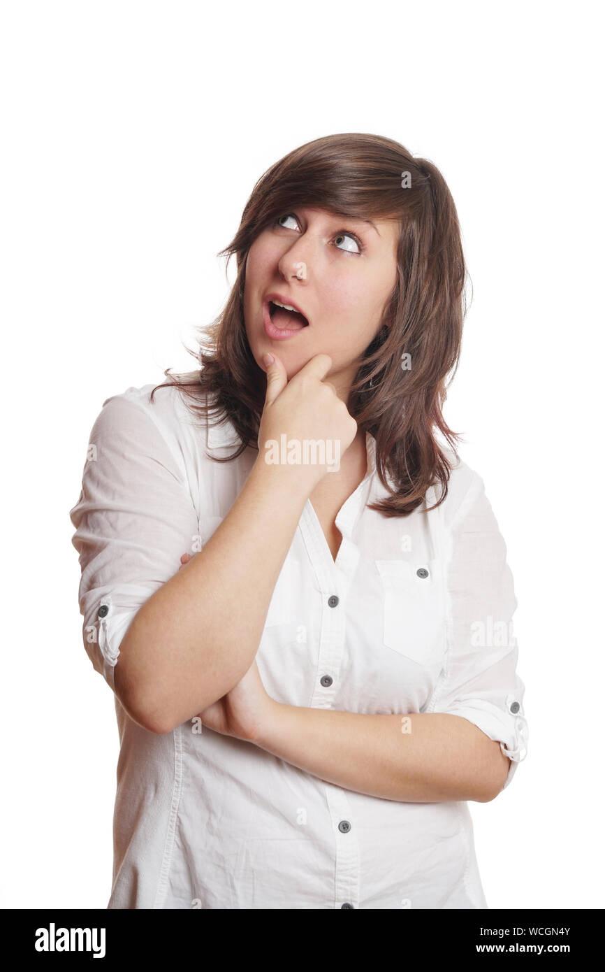 open-mouthed young woman looking up in anticipation Stock Photo