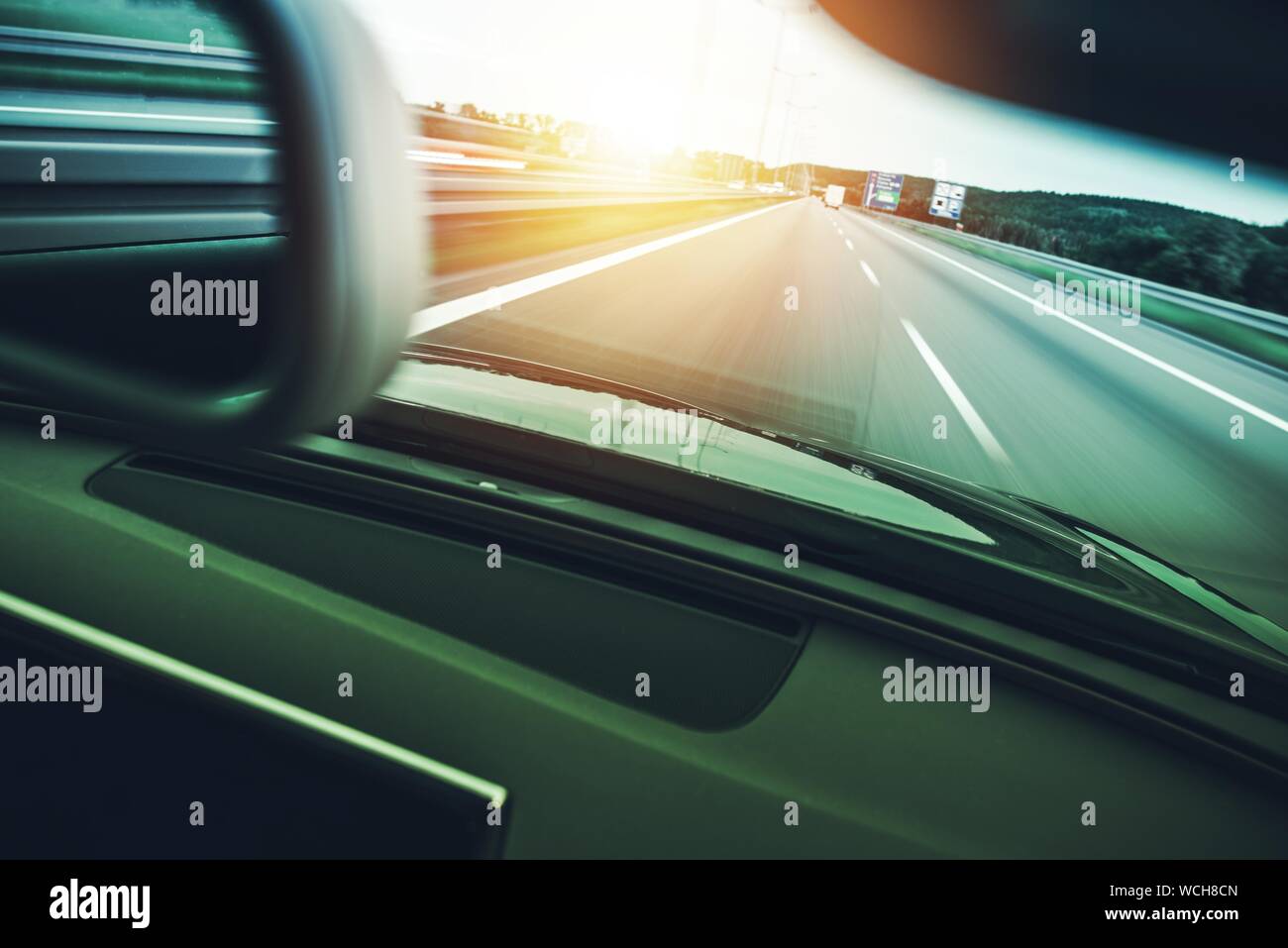 Blurred Motion Of Car On Road Stock Photo