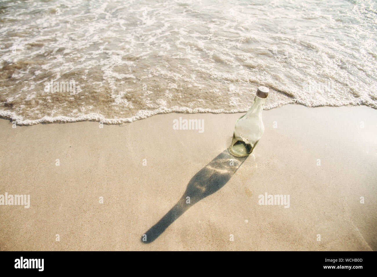 Glass bottle beach hires stock photography and images Alamy