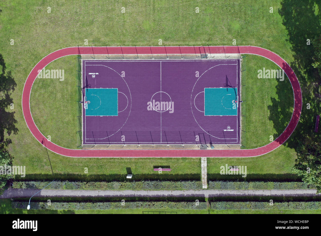 new basketball court in small stadium, aerial Stock Photo