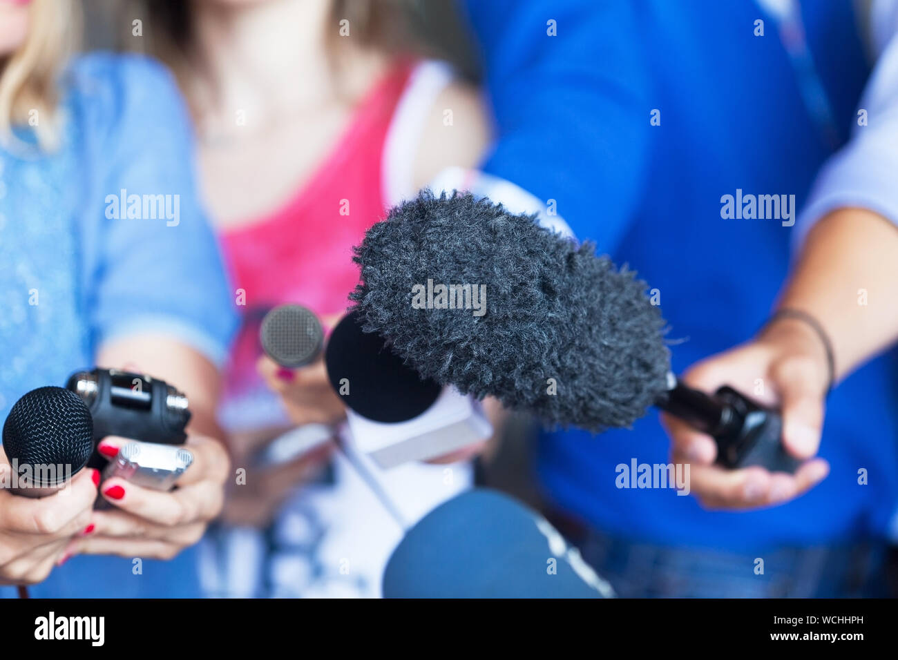 Journalists Taking Interview Stock Photo