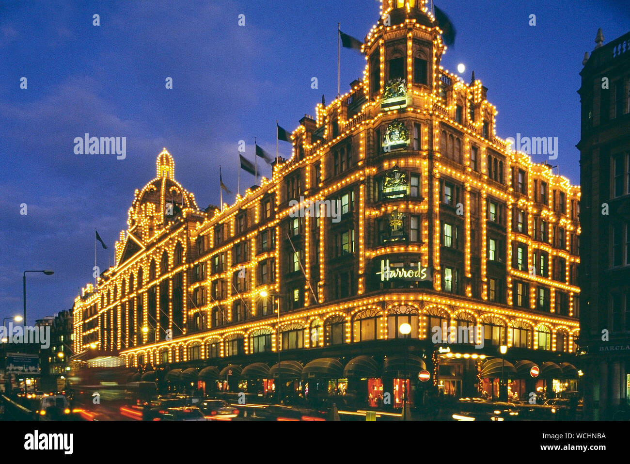 Night time at Harrods, Knightsbridge, London, England, UK. Circa 1980's