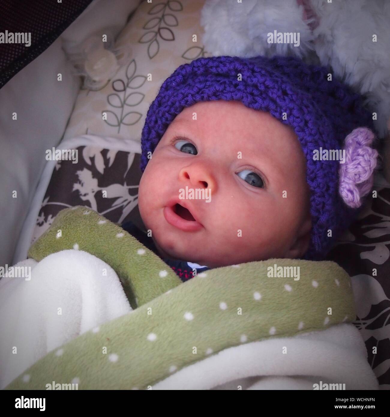 Close up of a baby wearing a knit hat hi-res stock photography and ...