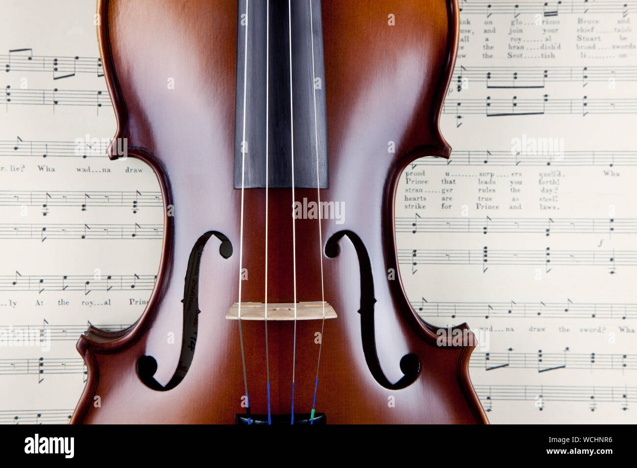 Classical violin on open old manuscript book Stock Photo Alamy