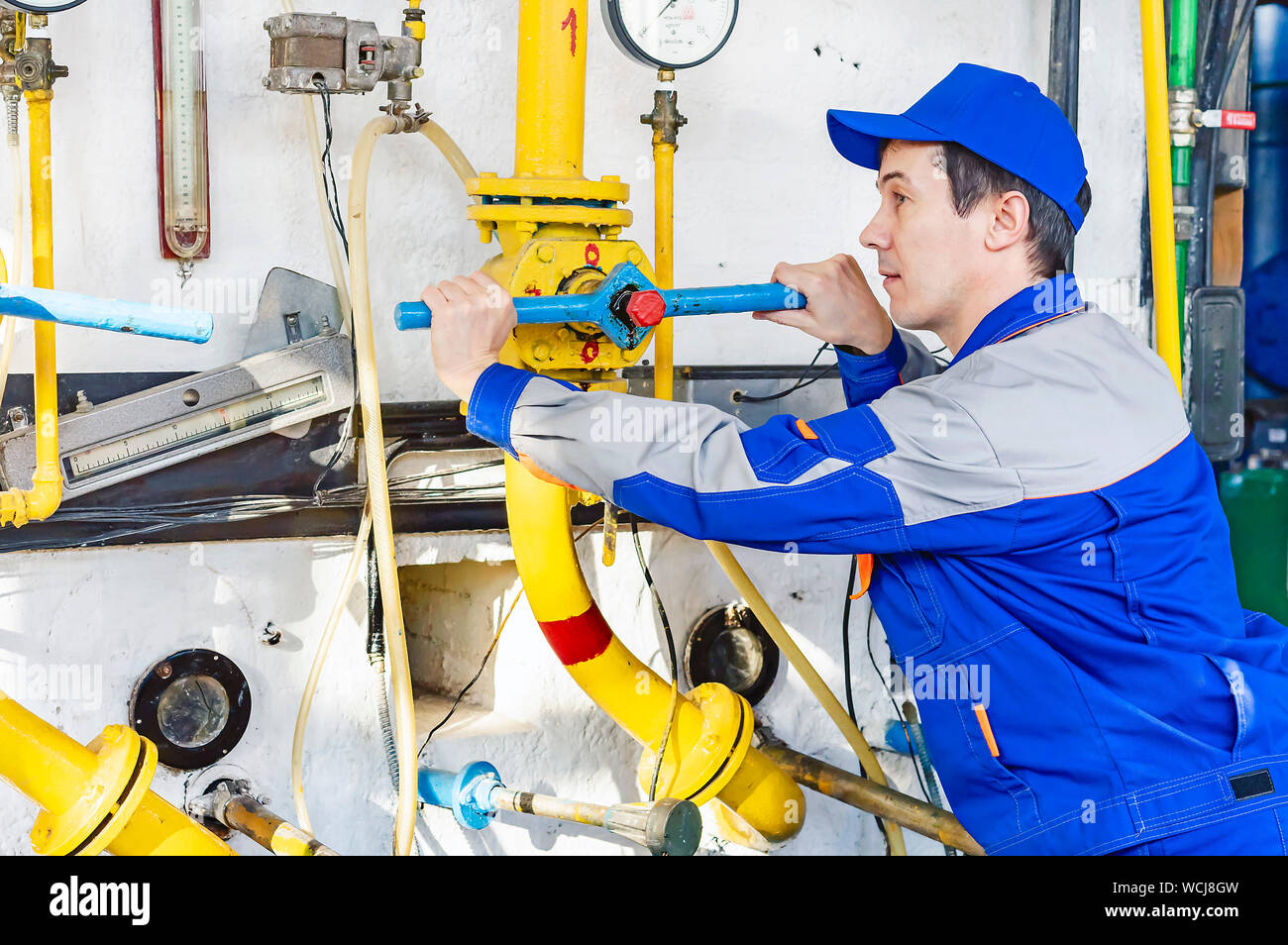 An Experienced Operator Service Gas Boiler Equipment Stock Photo Alamy
