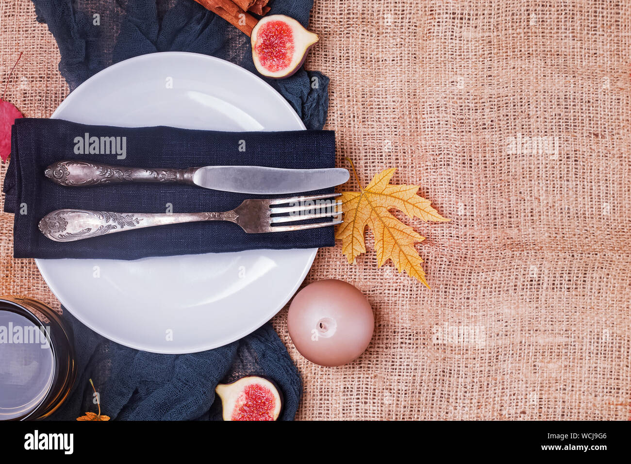 Table decorated for Thanksgiving dinner. Autumn table setting, top view Stock Photo