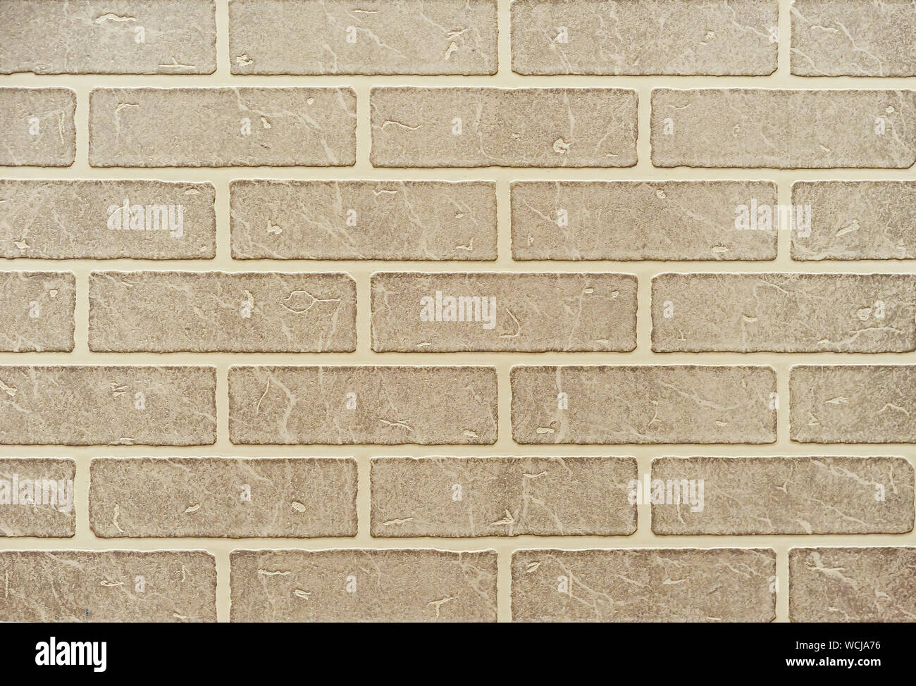 Texture of a light brown brick wall for background Stock Photo - Alamy