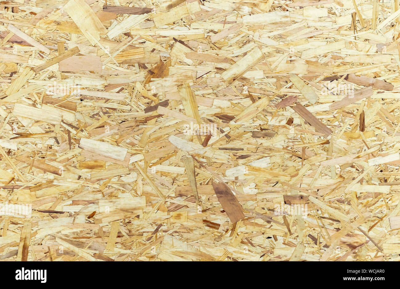 Chipboard background. Rough plywood texture. Plate of compressed ...