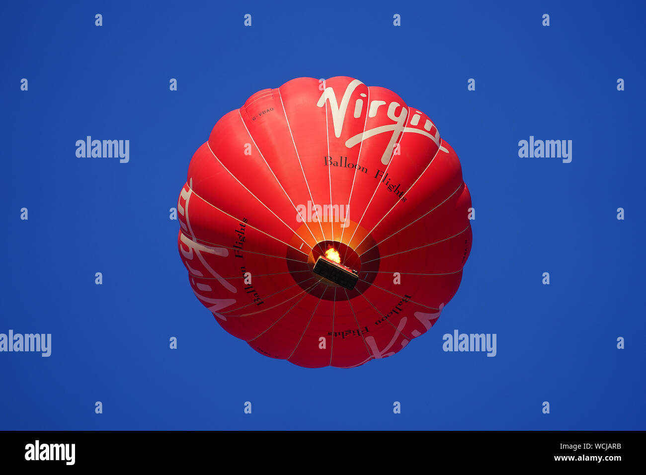 The Virgin hot air balloon overhead Stock Photo