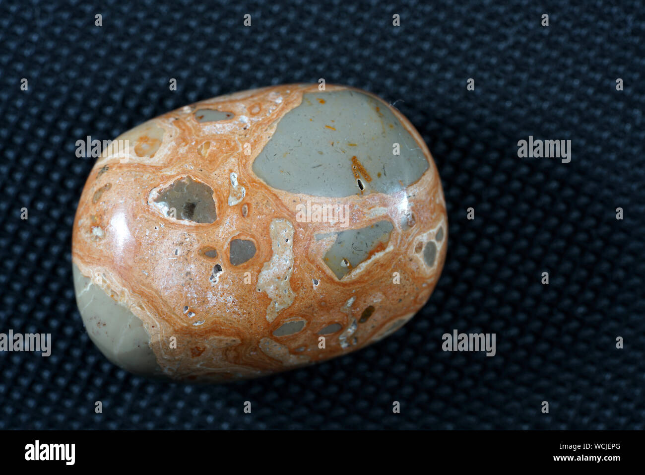 Jasper is a microcrystalline, fine-grained variety of the mineral quartz (SiO2) and closely related to the always fibrous chalcedony. Stock Photo