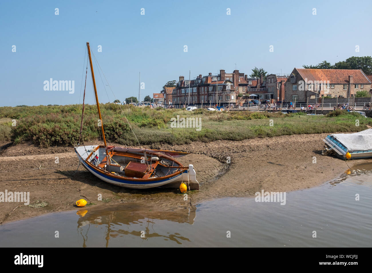 Norfolk coastal town of Blakeney, with River Glaven in foreground Stock Photo