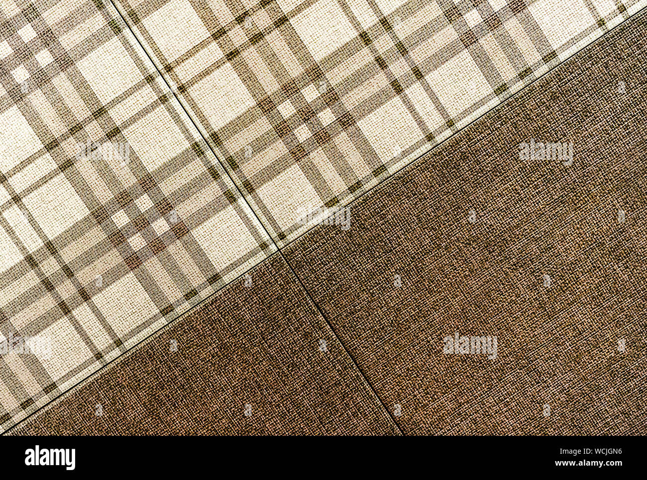 Brown ceramic tile with a cage. Background of ceramic tiles. Stock Photo