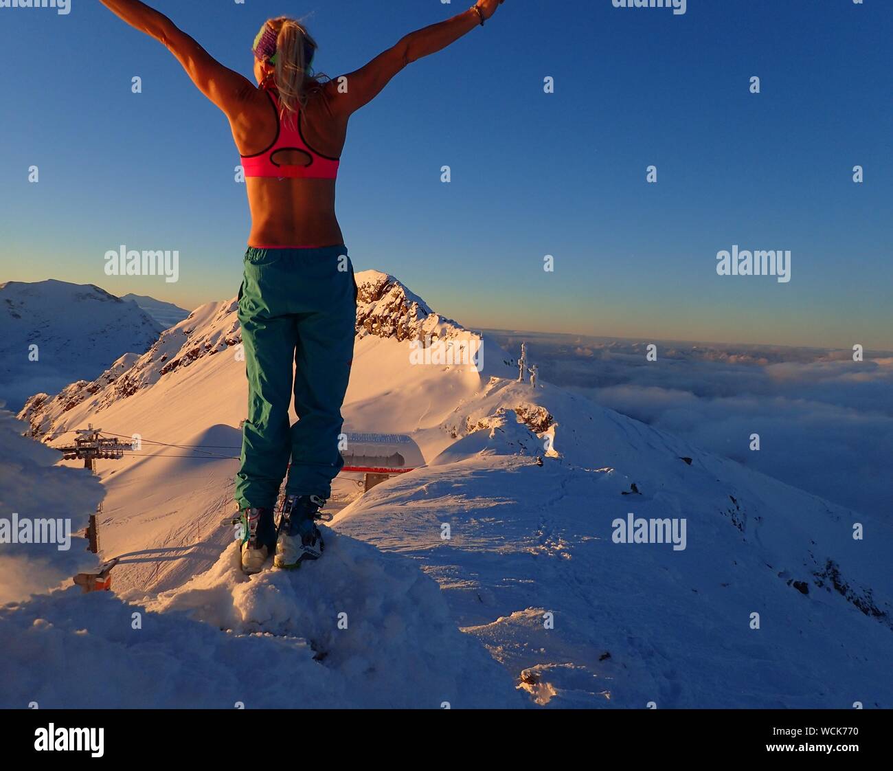 Rear View Of Woman Standing On Mountain Peak At Molltaler Gletscher Stock Photo