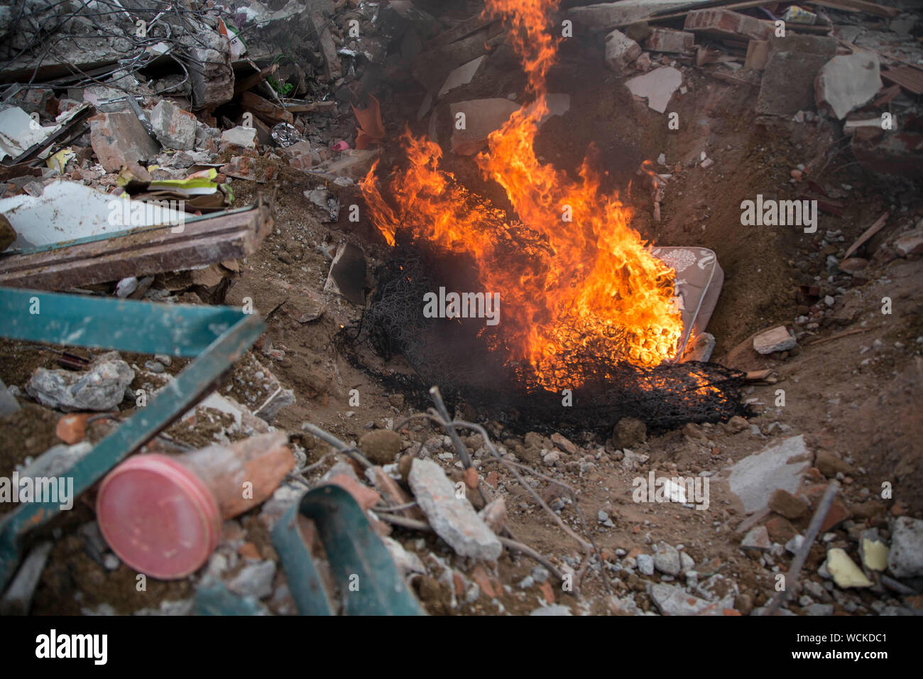 Burning Mattress At Junkyard Stock Photo Alamy