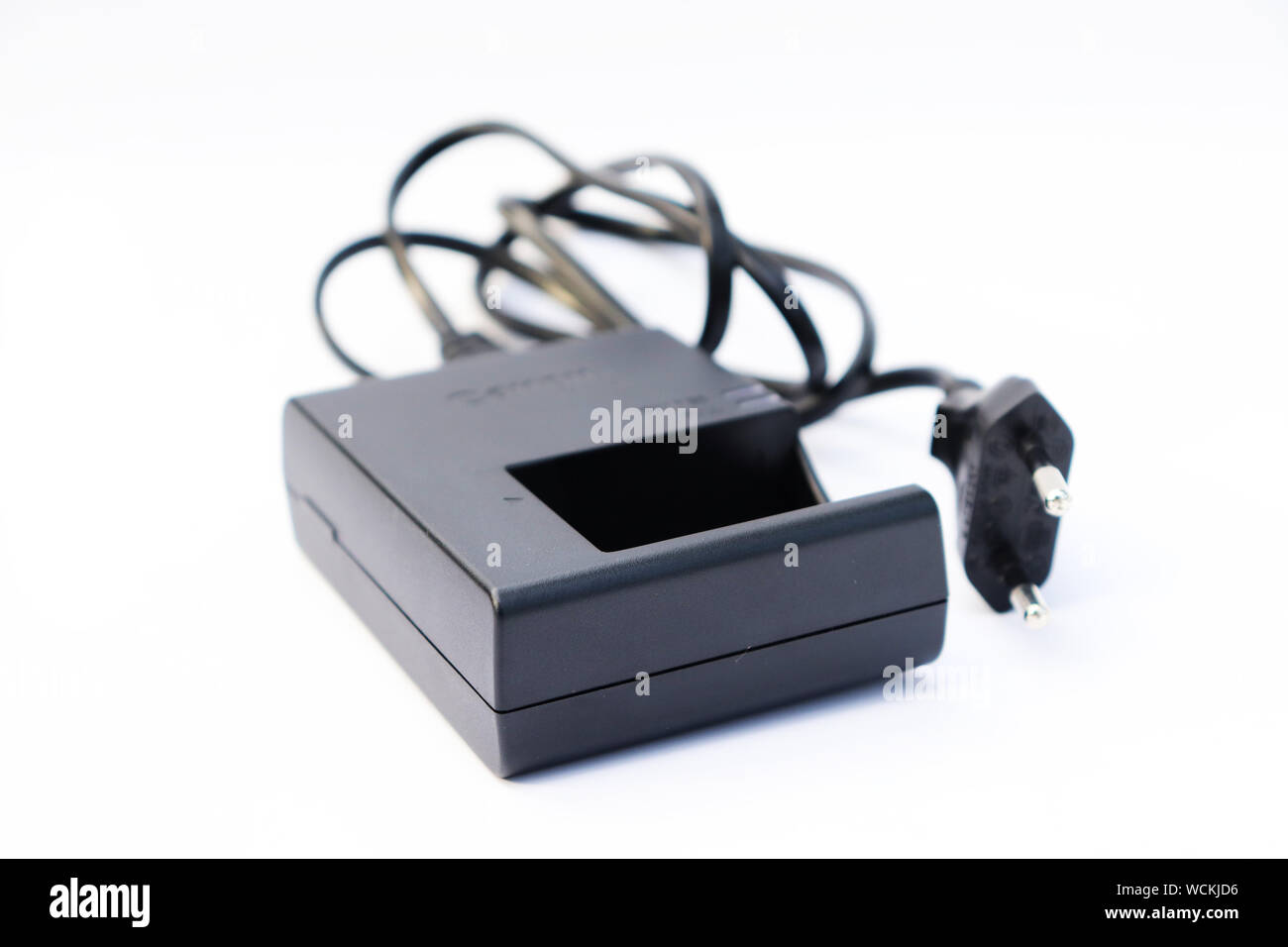 Camera Charger On White Background With Wire Stock Photo Alamy