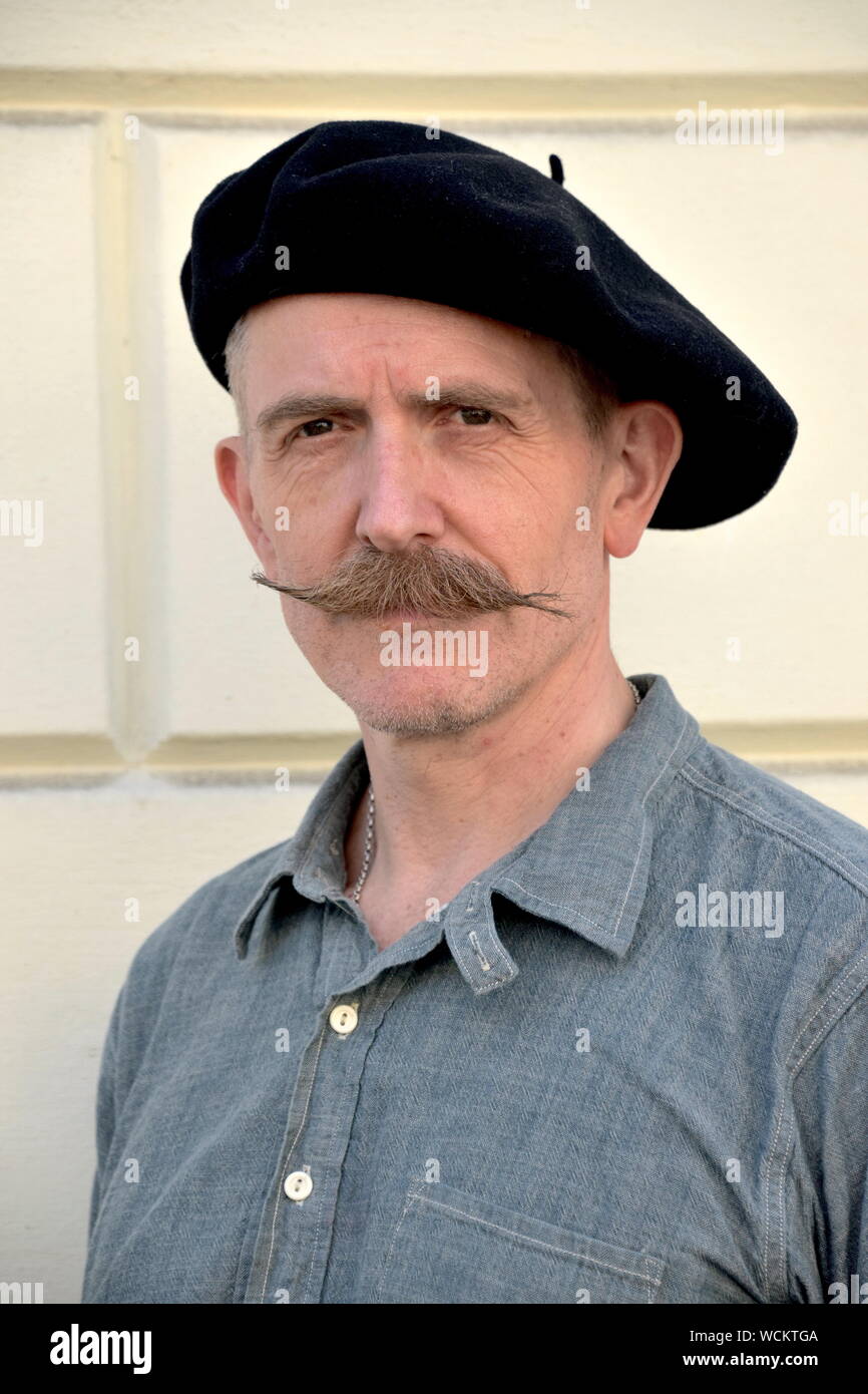 Billy Childish, a prolific British artist, musician, and author who employs multiple mediums for creative expression. Stock Photo