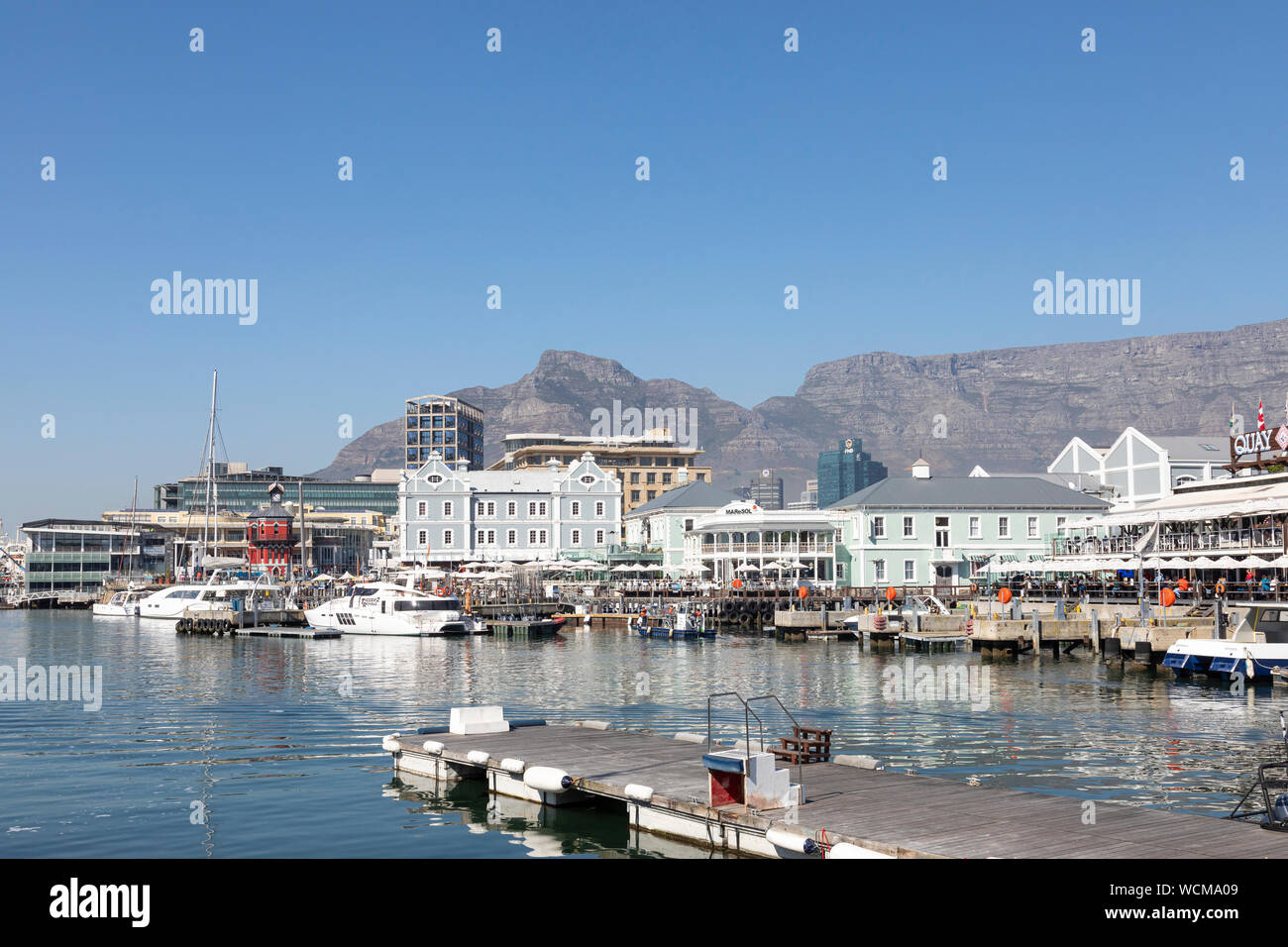 The harbour at the V and A Waterfront, Cape Town, Western Cape, South Africa with Devils Peak and Table Mountain behind Stock Photo