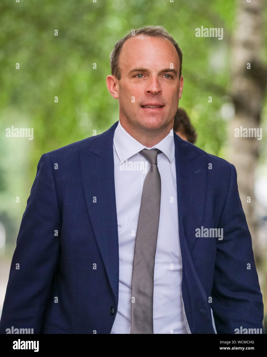 Westminster, London, UK. 28th August 2019. Dominic Raab, MP, Secretary of State for Foreign and Commonwealth Affairs, walks along Downing Street and enters No10. PM Boris Johnson's government has today officially asked the Queen to approve the prorogation of Parliament for 1 month, starting in September. Credit: Imageplotter/Alamy Live News Stock Photo