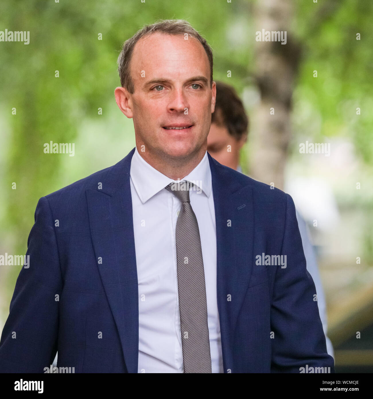 Westminster, London, UK. 28th August 2019. Dominic Raab, MP, Secretary of State for Foreign and Commonwealth Affairs, walks along Downing Street and enters No10. PM Boris Johnson's government has today officially asked the Queen to approve the prorogation of Parliament for 1 month, starting in September. Credit: Imageplotter/Alamy Live News Stock Photo
