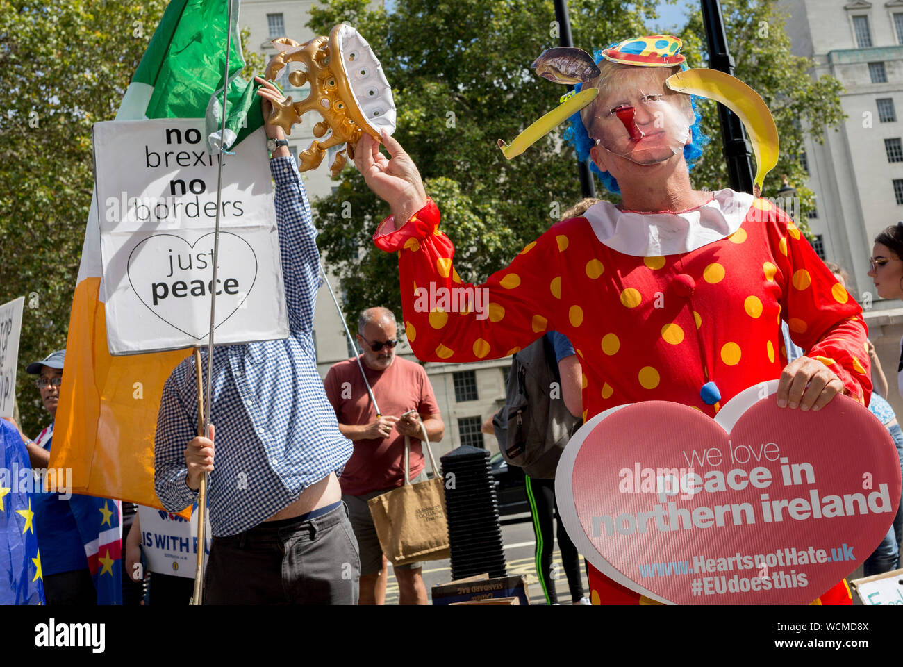 On the day that British Prime Minister Boris Johnson sought to have Parliament suspended by Queen Elizabeth, days after MPs return to work in September - and only a few weeks before the Brexit deadline, pro-EU Remain voters protest outside the Cabinet Office where daily Brexit contingency planning meetings take place, on 28th August 2019, in Whitehall, Westminster, London, England. Stock Photo