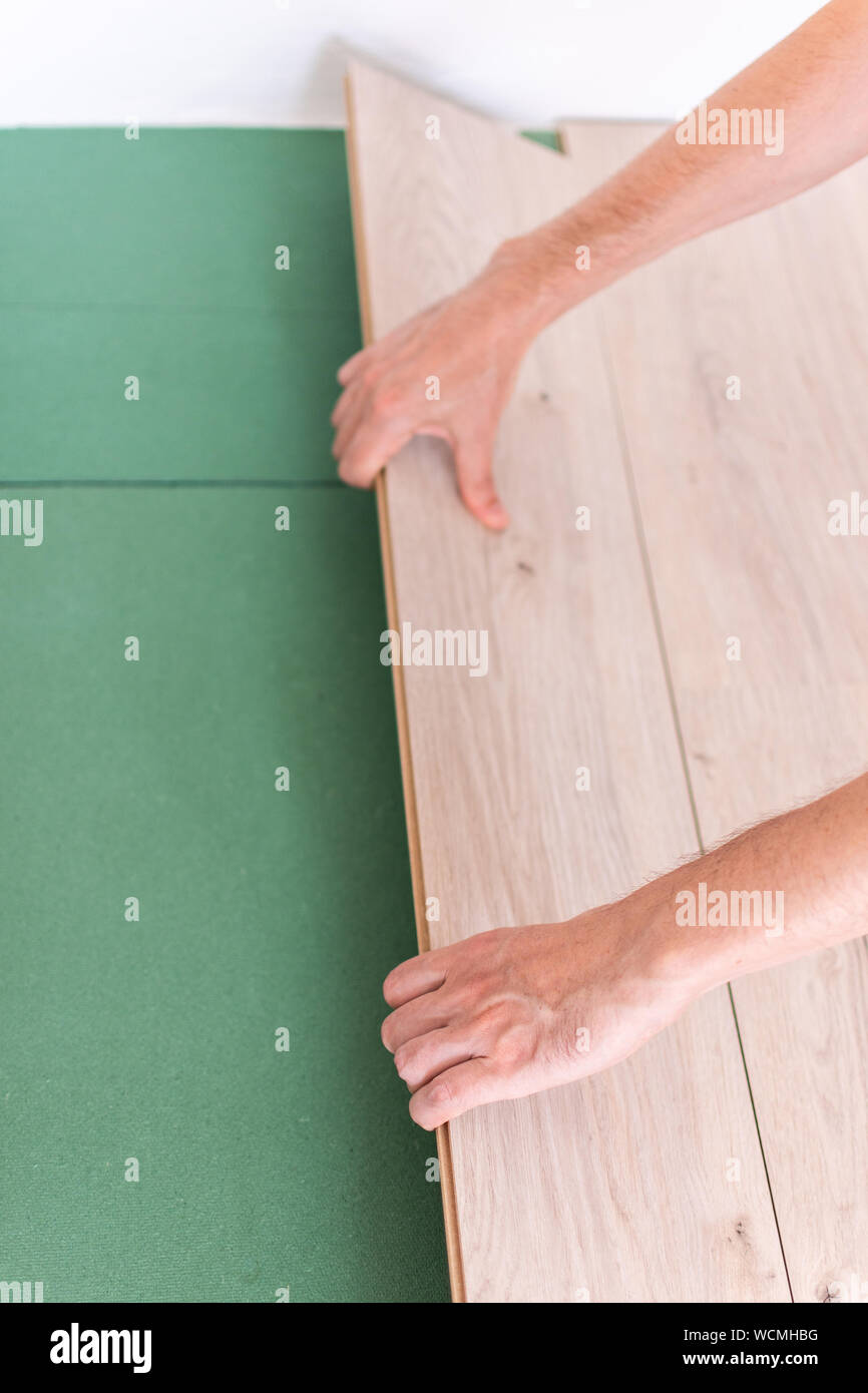 Installation Laminate Or Parquet In The Room Worker