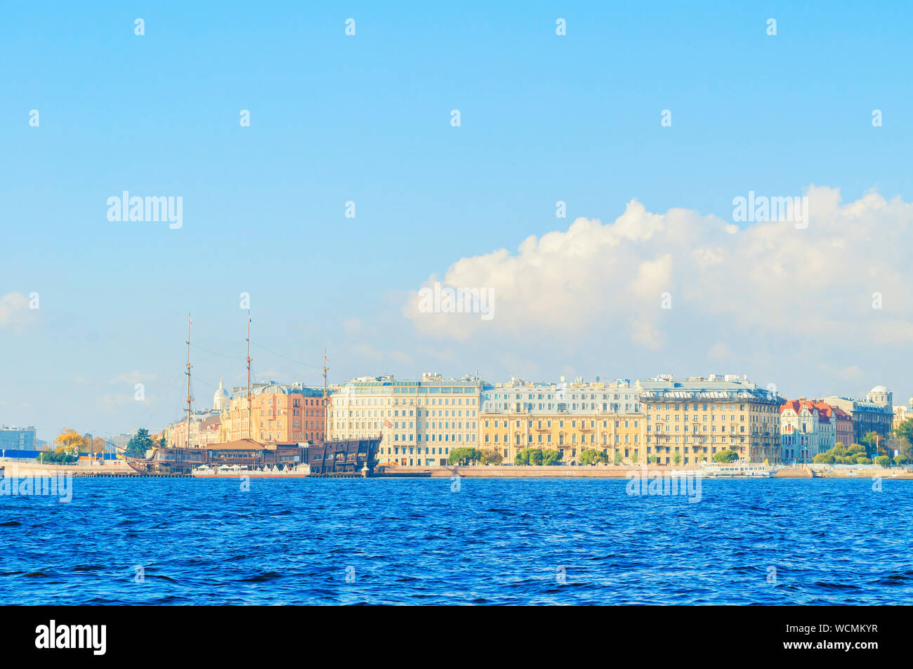 St Petersburg, Russia -October 3, 2016. Mytninskaya embankment and city buildings near the Neva river with Flying Dutchman - the restaurant on the wat Stock Photo
