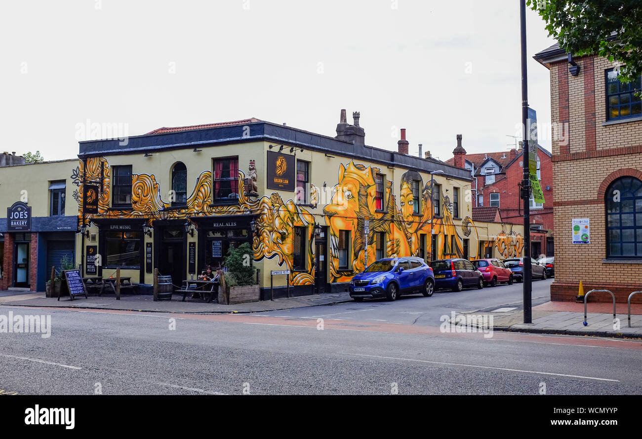 Horfield Bristol UK - The Golden Lion pub in Gloucester Road with elaborate mural on exterior Stock Photo