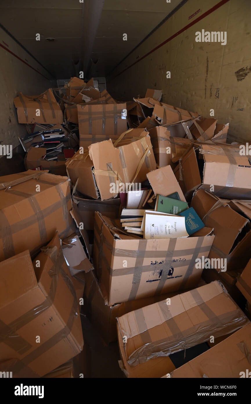Kuwait City, Kuwait. 28th Aug, 2019. Books seized by Iraqi side during its invasion of Kuwait in 1990 are seen in a truck at a handover ceremony in Kuwait City, Kuwait, on Aug. 28, 2019. Iraq handed over on Wednesday 42,000 books to Kuwait which were seized by Iraqi side during the Iraqi invasion of Kuwait. Credit: Asad/Xinhua Stock Photo