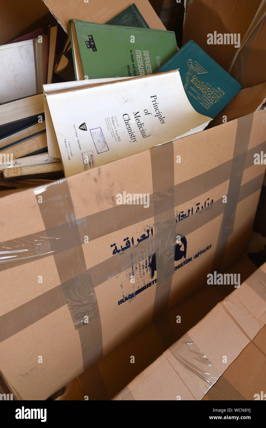 Kuwait City, Kuwait. 28th Aug, 2019. Books seized by Iraqi side during its invasion of Kuwait in 1990 are seen in a truck at a handover ceremony in Kuwait City, Kuwait, on Aug. 28, 2019. Iraq handed over on Wednesday 42,000 books to Kuwait which were seized by Iraqi side during the Iraqi invasion of Kuwait. Credit: Asad/Xinhua Stock Photo