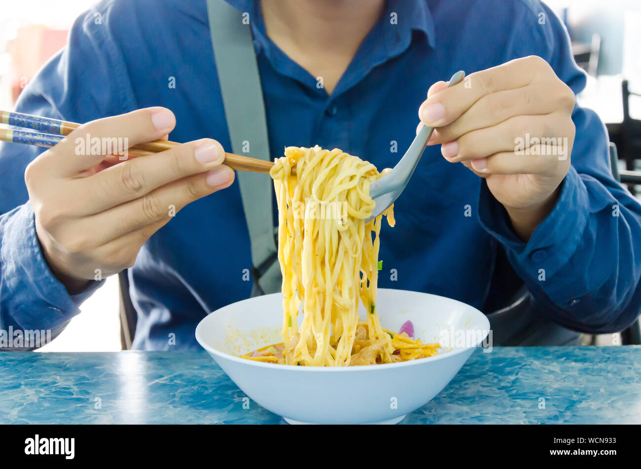 Man eating pasta hires stock photography and images Alamy