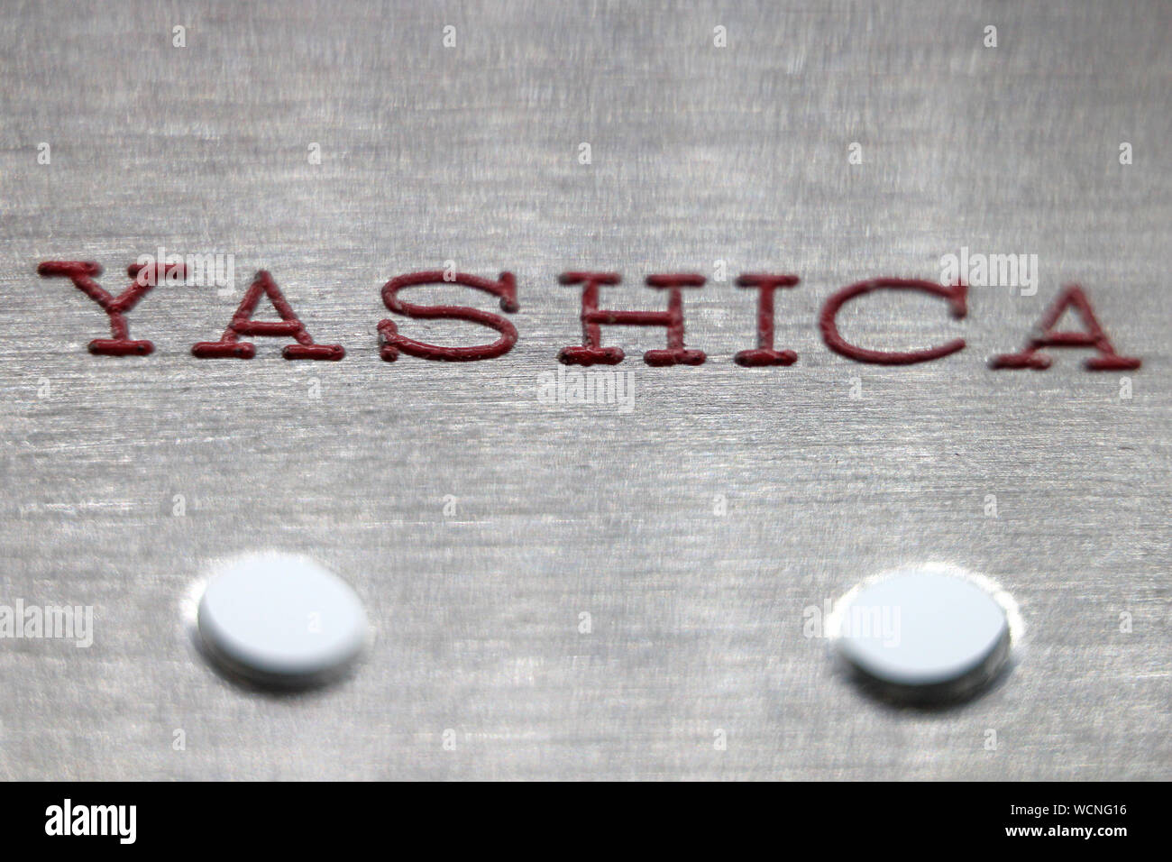 Yashica logo printed in super 8 movie editing splicer, isolated on white background, close-up Stock Photo
