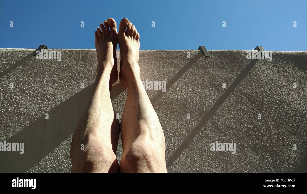 Feet against wall hires stock photography and images Alamy